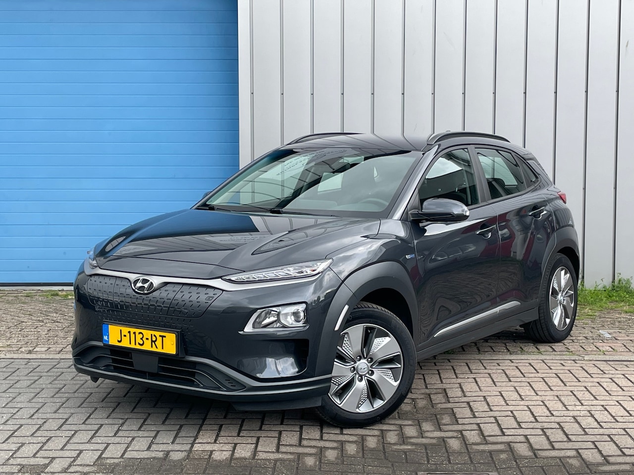 Hyundai Kona Electric - EV Comfort 64 kWh FASE 3 SOH 100% TREKHAAK - AutoWereld.nl