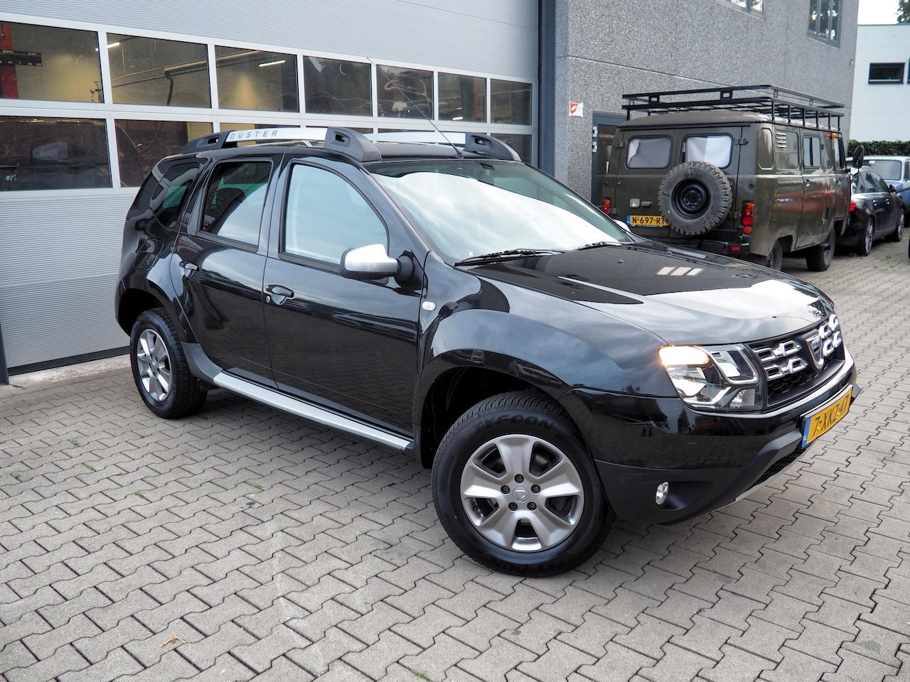 Dacia Duster - 1.2 TCe 4x2 Prestige AIRCO CRUISE NAVI TREKH. - AutoWereld.nl