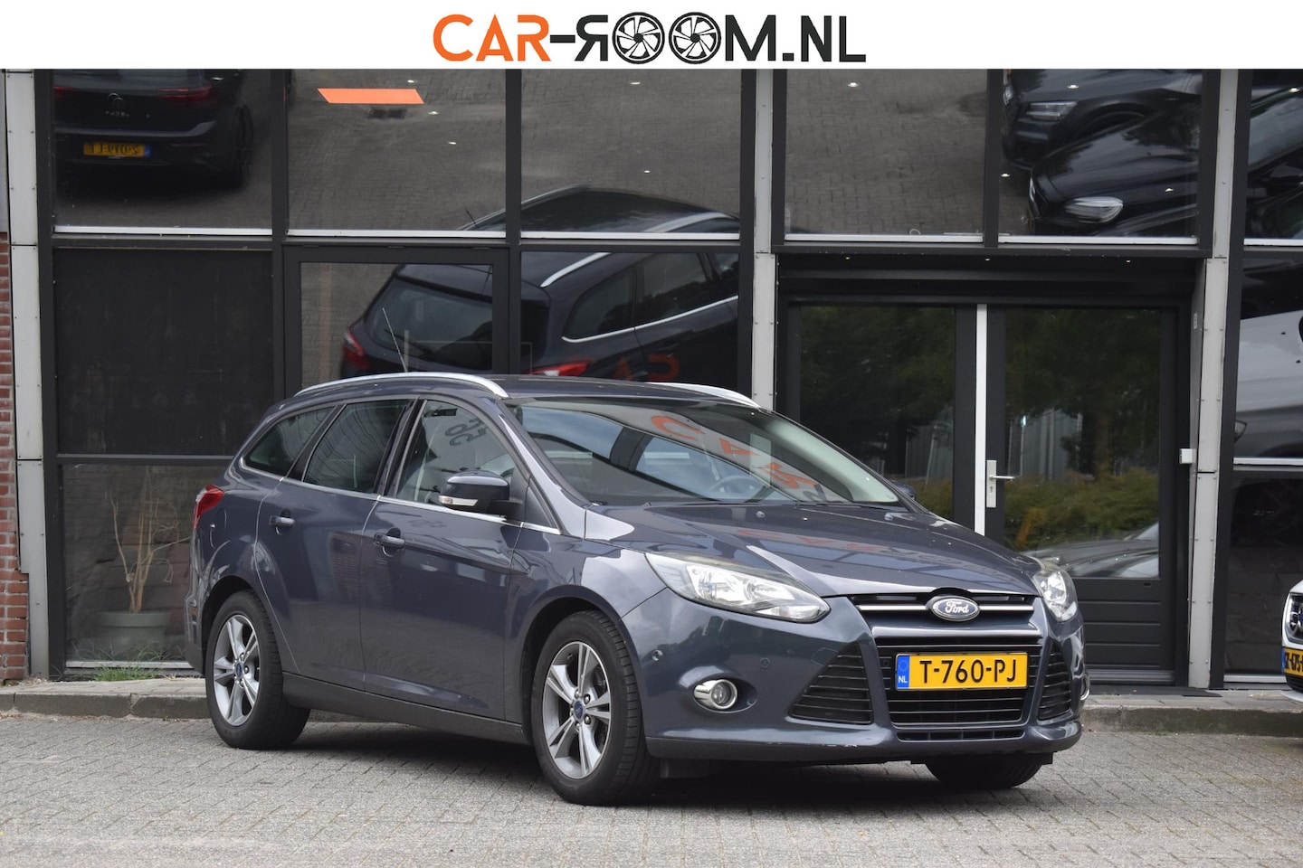 Ford Focus Wagon - 1.0 EcoBoost Titanium Stoelverwarming Navi Cruise - AutoWereld.nl