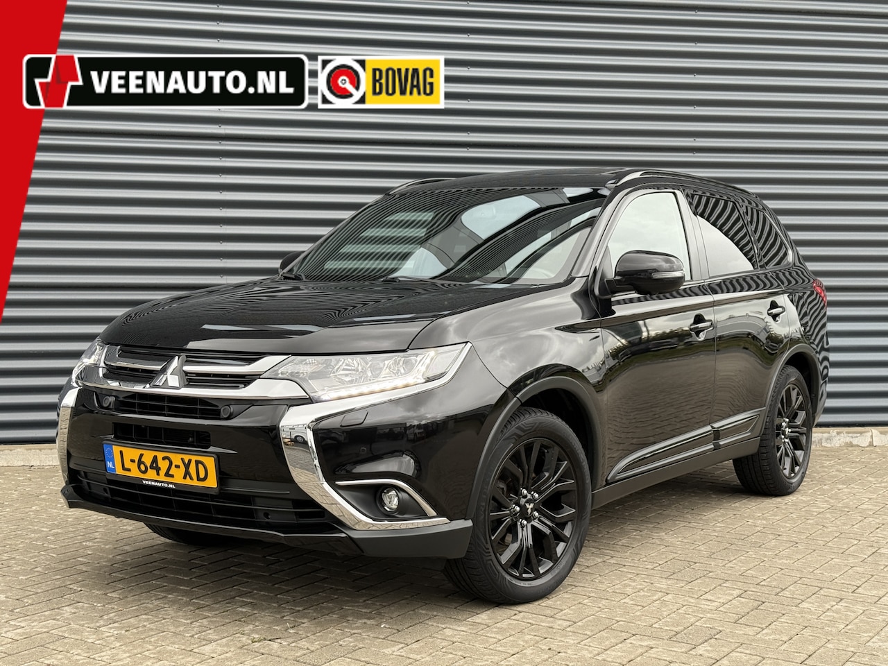 Mitsubishi Outlander - 2.0 Aut. 7-Persoons Black Edition Trekhaak/Open dak/Camera - AutoWereld.nl