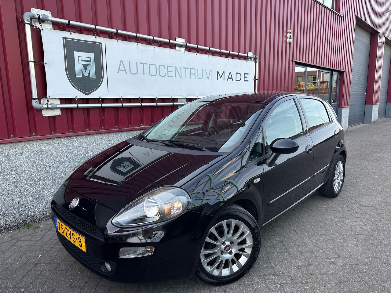 Fiat Punto Evo - 0.9 TwinAir Easy // 140 DKM NAP // Clima // Navi // Trekhaak - AutoWereld.nl