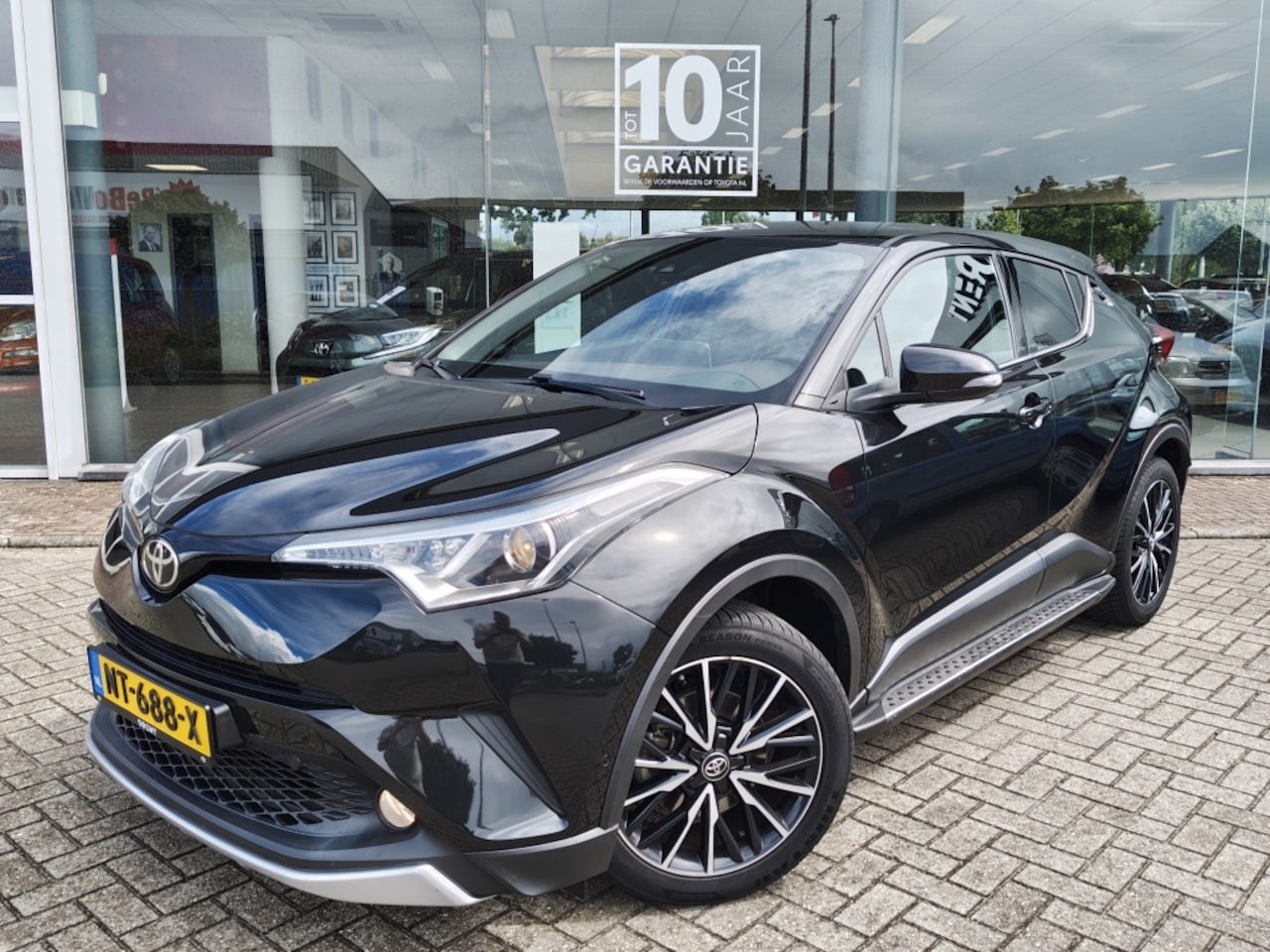 Toyota C-HR - 1.2 Executive | Sport Pakket | 1300KG Trekgew. | Trekhaak | Navi - AutoWereld.nl