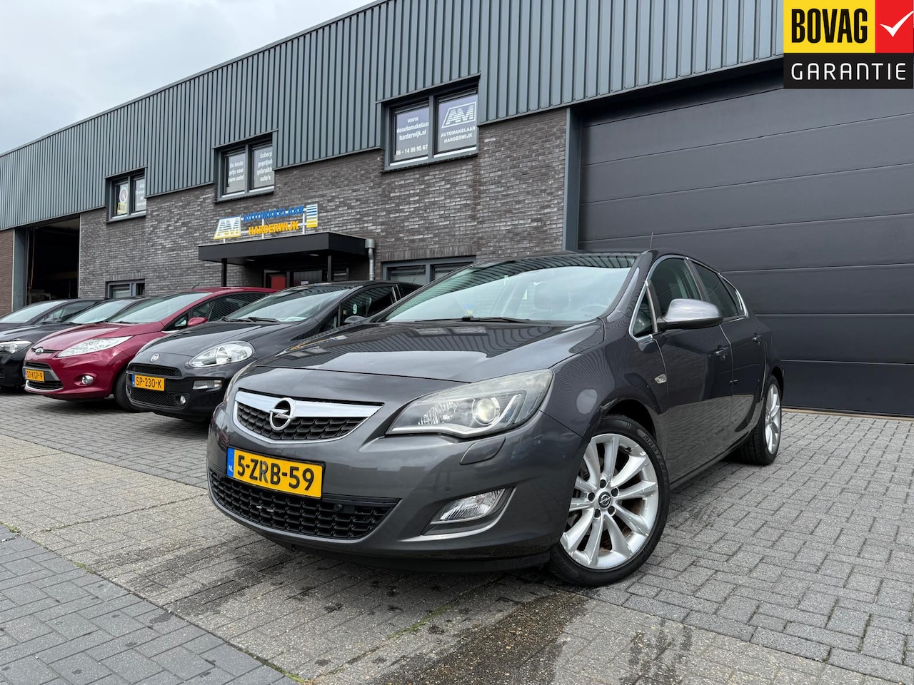 Opel Astra - 1.6 Turbo Sport | 1E EIGENAAR | 12MND GARANTIE | AUTOMAAT | AIRCO | CRUISE | XENON | LMV | - AutoWereld.nl
