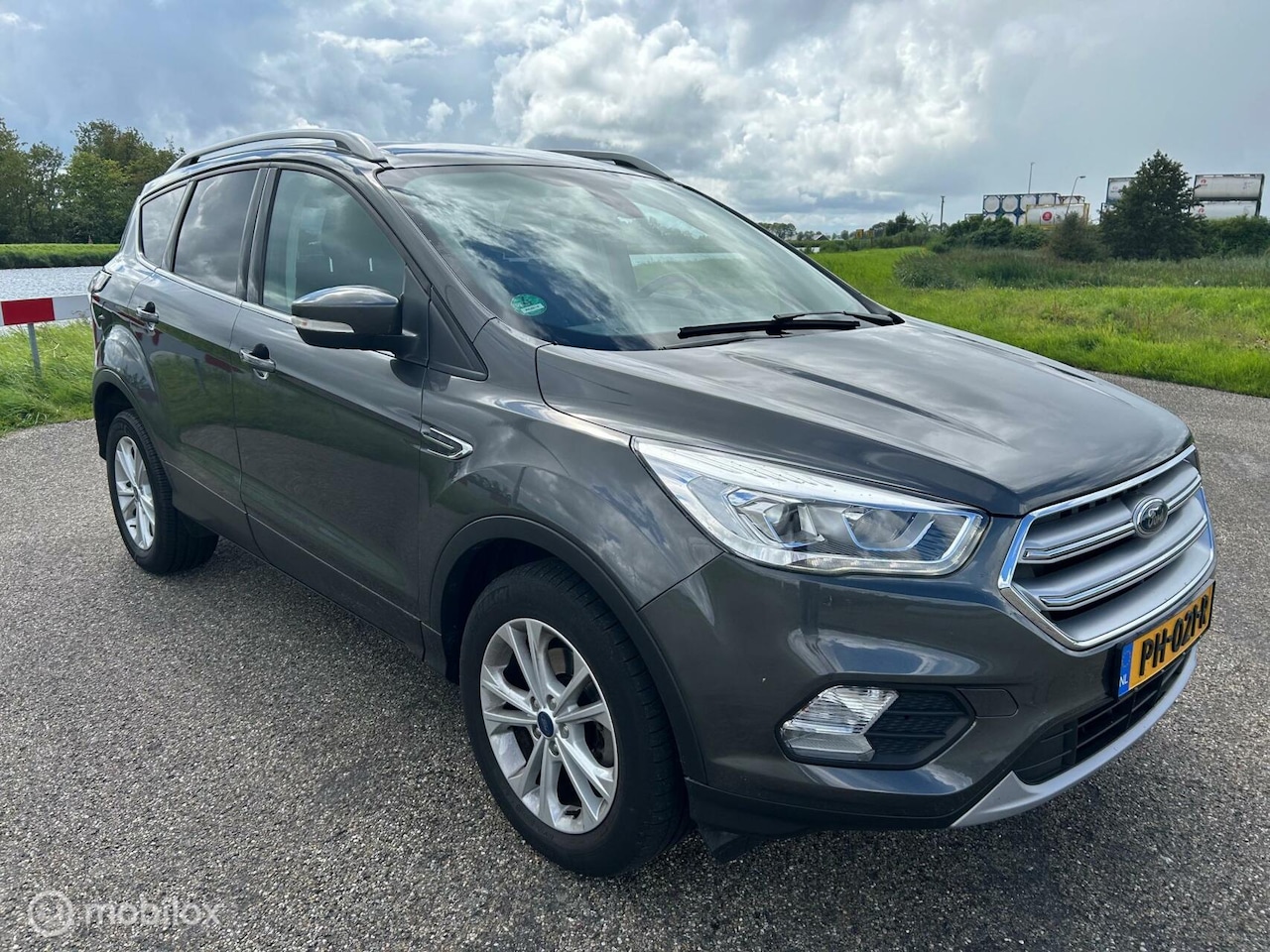 Ford Kuga - 1.5 EcoBoost Titanium Navigatie Trekhaak 2000 Kg ! - AutoWereld.nl