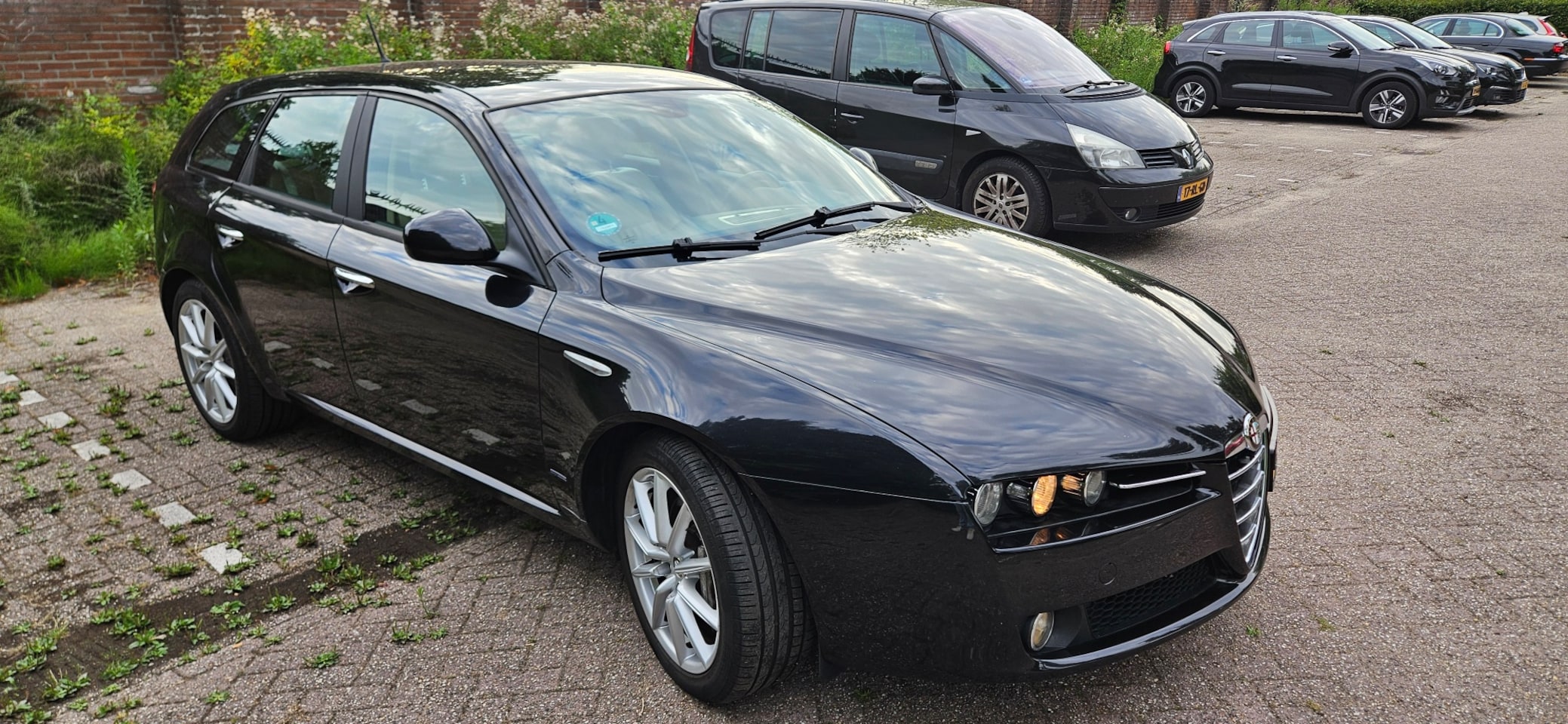 Alfa Romeo 159 Sportwagon - 1.7 T Distinctive 235pk Squadra getuned - AutoWereld.nl