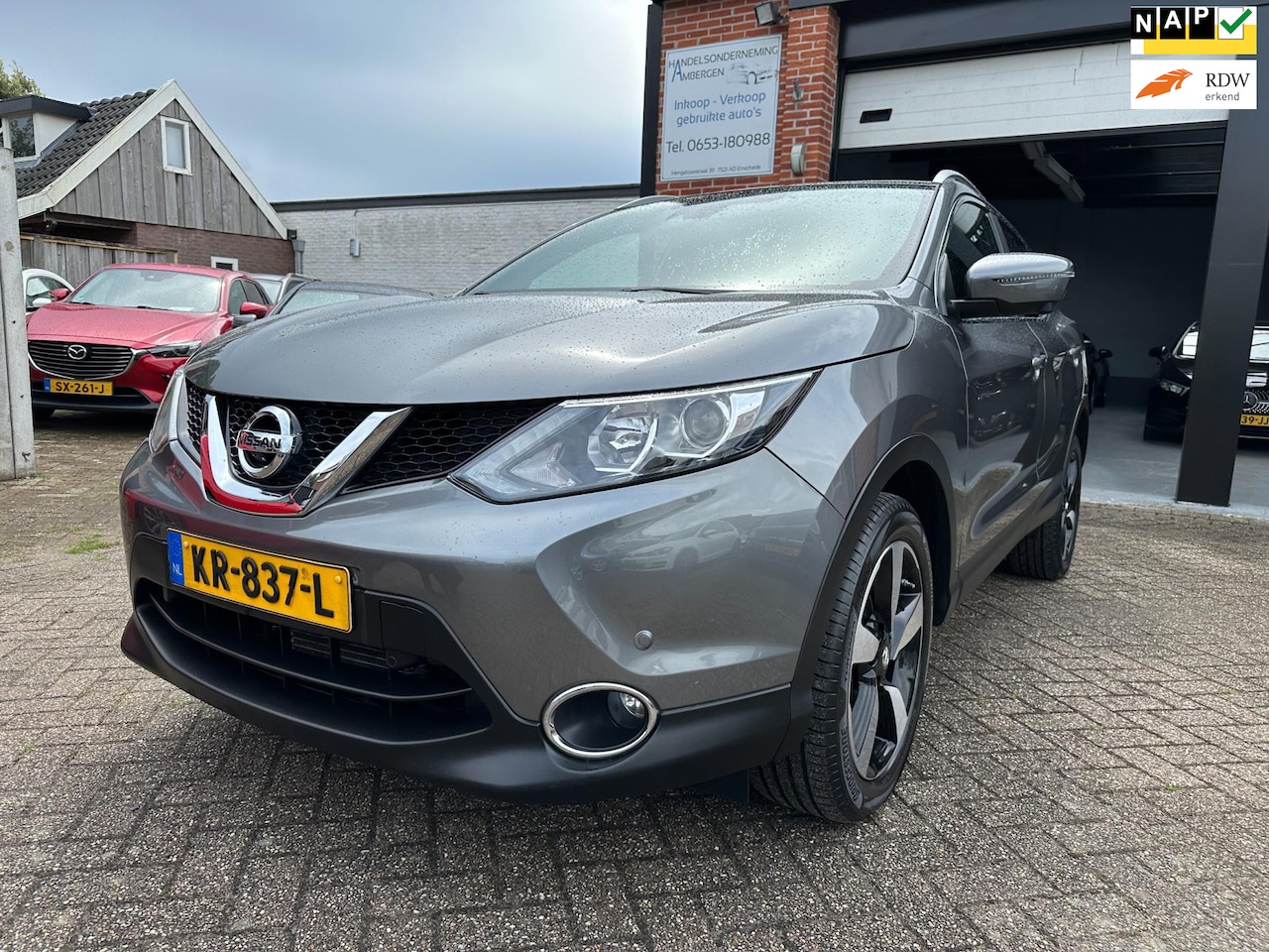 Nissan Qashqai - 1.2 N-Vision AUTOMAAT-NAVI-CRUISE-ACHTERUITRIJCAMERA-PANORAMADAK - AutoWereld.nl