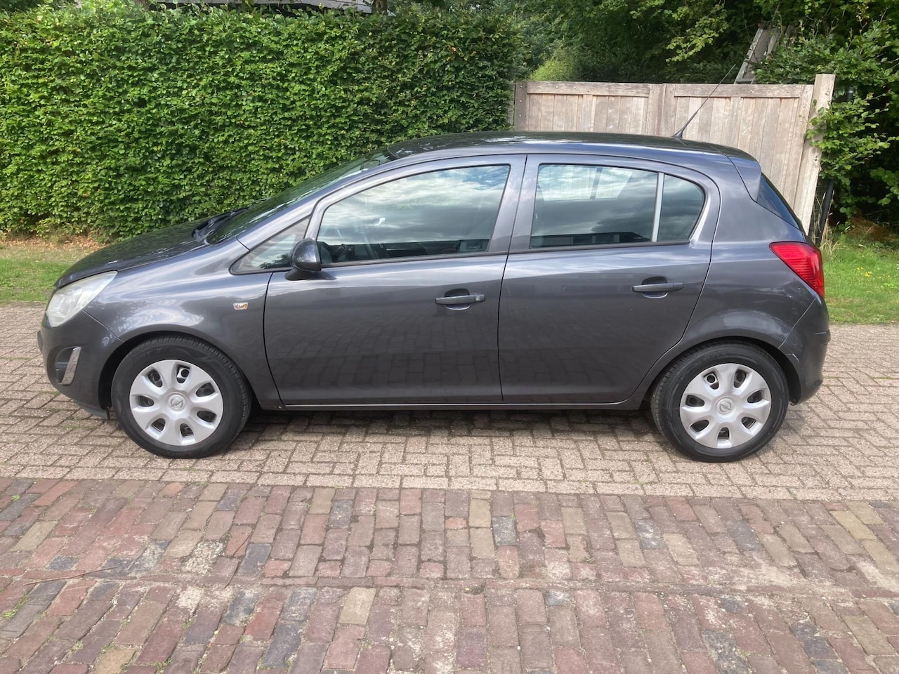 Opel Corsa - 1.2-16V Anniversary Edition 1.2-16V Anniversary Edition 5 Drs, Airco, CC, NAP. - AutoWereld.nl