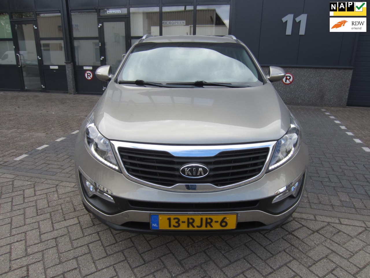 Kia Sportage - 1.6 GDI ISG X-ecutive 2011 Airco Cruise NAP! APK! - AutoWereld.nl