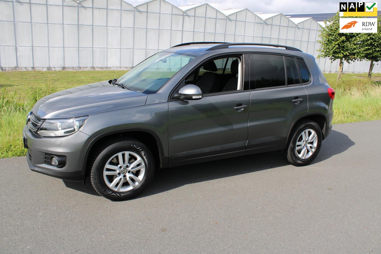 Volkswagen Tiguan - 1.4 TSI Sport&Style - AutoWereld.nl