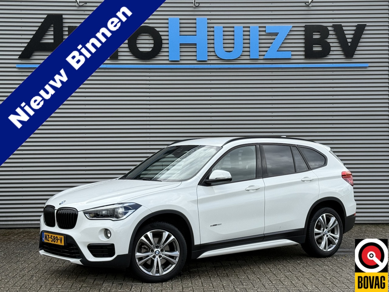 BMW X1 - sDrive18i Executive Sport Line 18 Inch Navigatie PDC Stuurverwarming - AutoWereld.nl