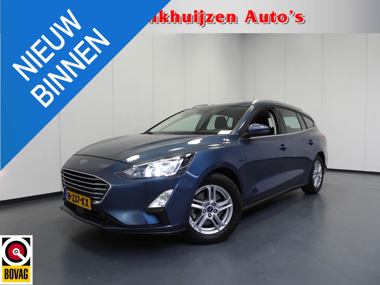 Ford Focus Wagon - 1.0 EcoBoost Trend Business NAVI/AIRCO/TREKHAAK/16"LMV! - AutoWereld.nl