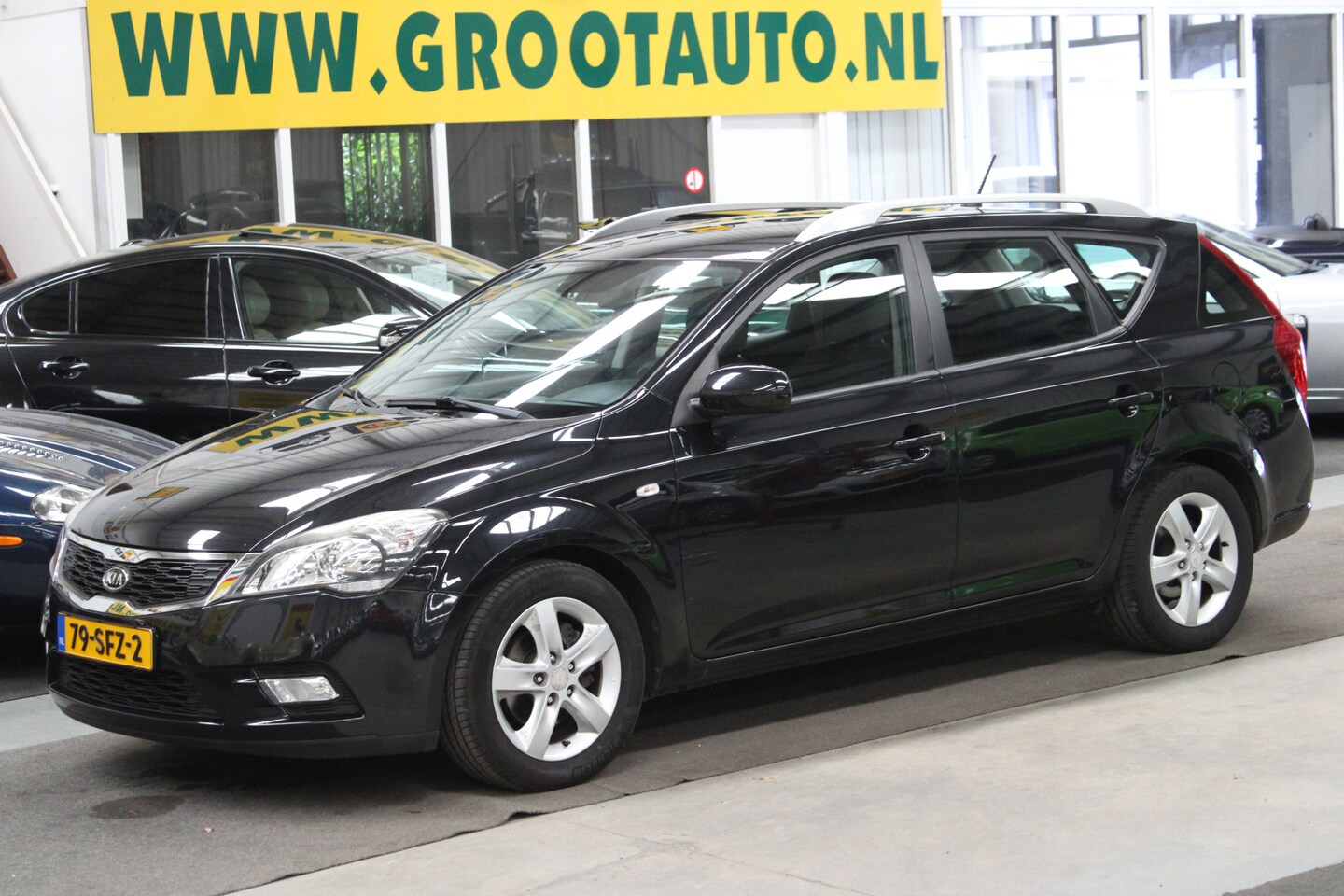 Kia Cee'd Sporty Wagon - 1.4 CVVT Navigator Plus Pack Airco, Cruise Control, Stuurbekrachtiging - AutoWereld.nl