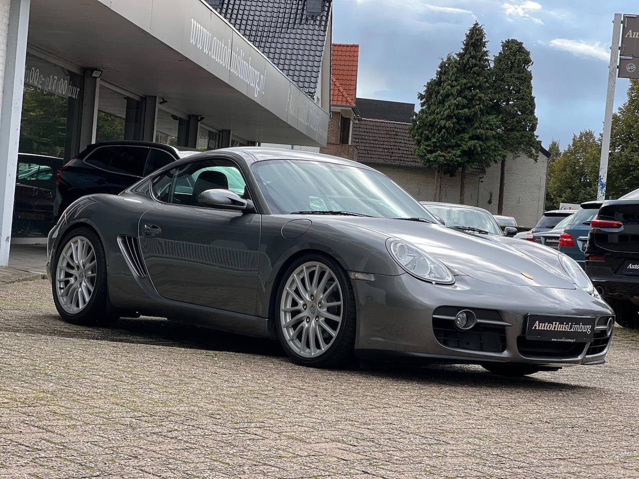 Porsche Cayman - 2.7|Schakel|Nieuwstaat|Sportchrono|Leer|Navigatie|PSM - AutoWereld.nl