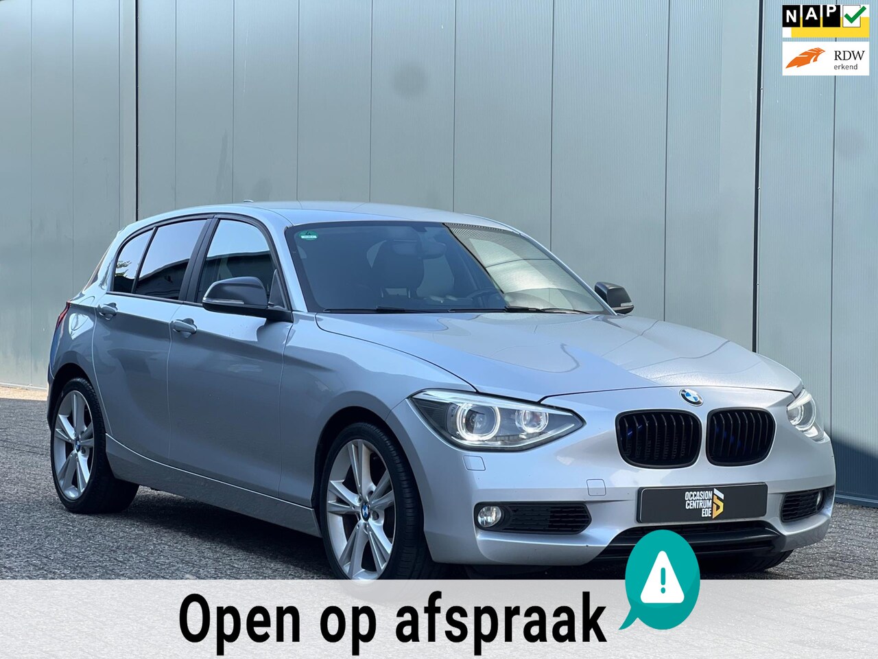 BMW 1-serie - 118i Leder|Xenon|NAP|Trekhaak|Topstaat! - AutoWereld.nl