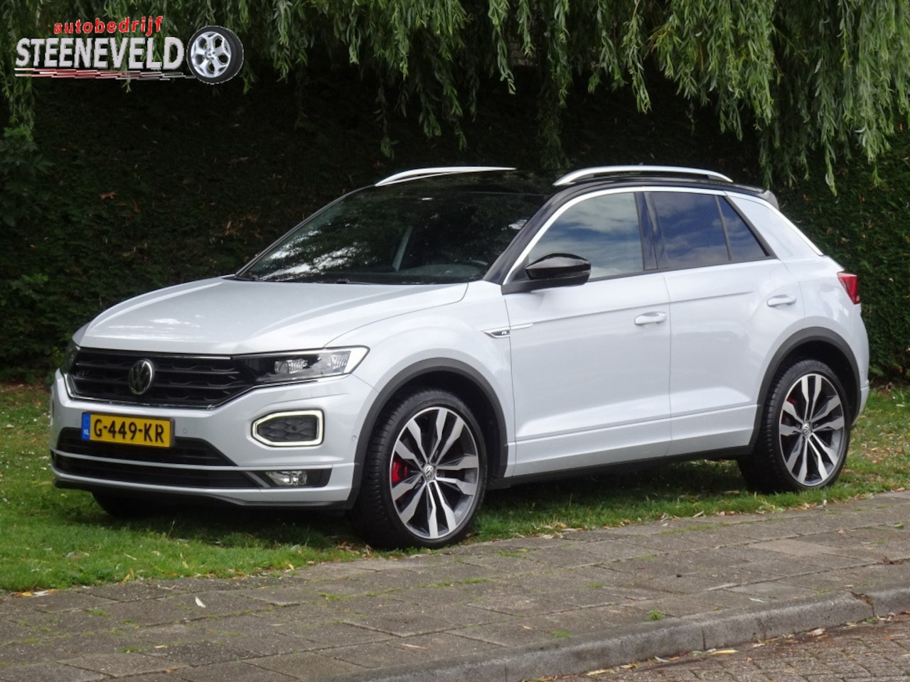 Volkswagen T-Roc - 1.5 TSI 150pk AUTOMAAT Sport 3x R-Line Trekhaak - AutoWereld.nl