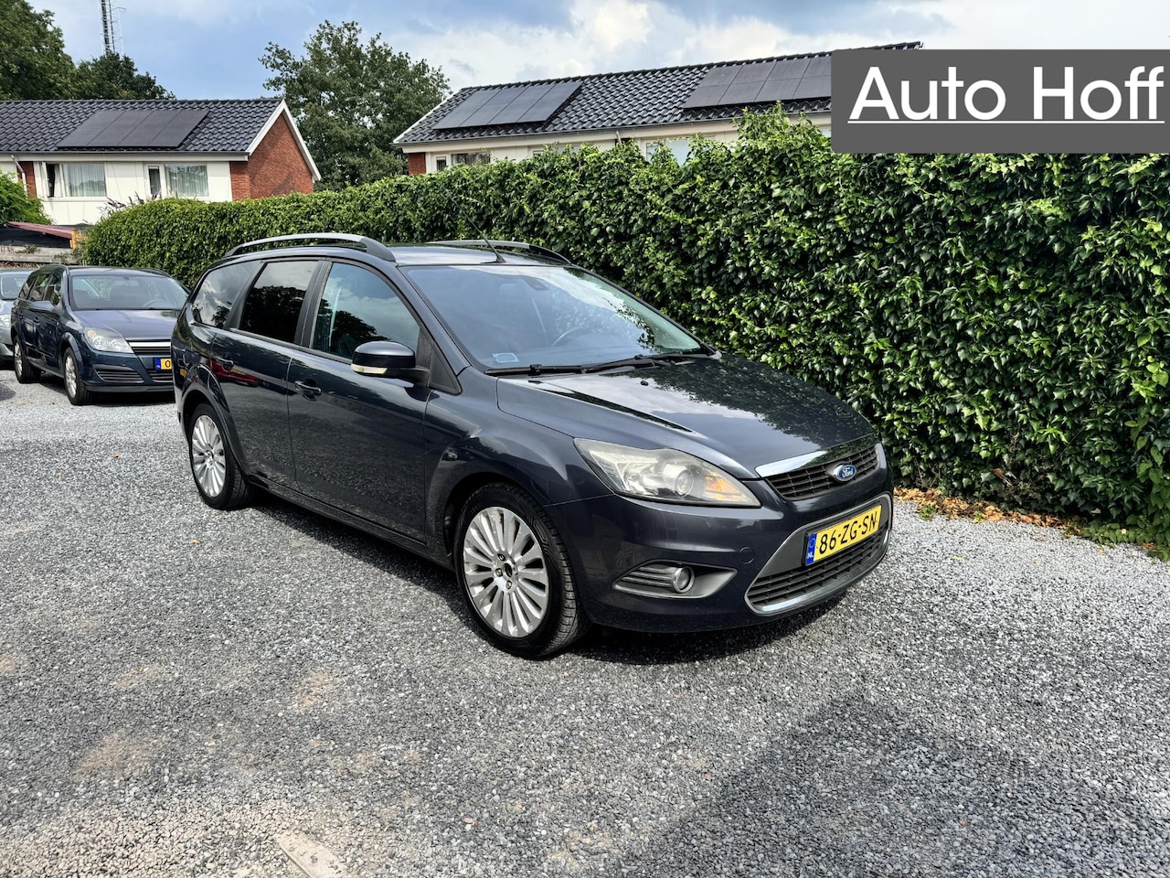 Ford Focus Wagon - 1.6 Titanium | Navi | Autom. Airco | Cruise Control | LMV | Privacy Glass | PDC | Trekhaak - AutoWereld.nl