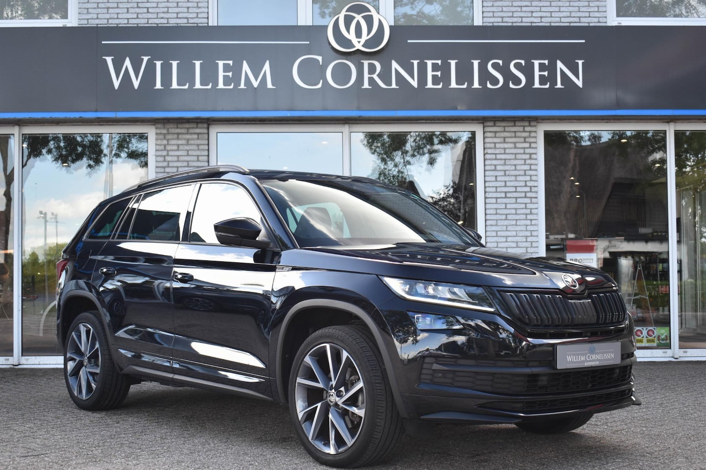 Skoda Kodiaq - 1.5 TSI Sportline Business 7p. Pano Camera 20" - AutoWereld.nl