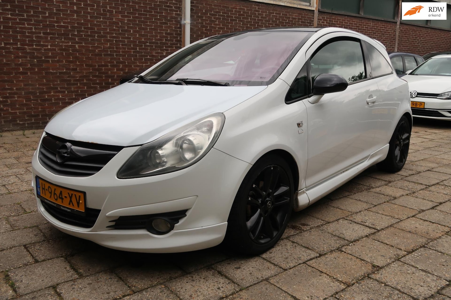 Opel Corsa - 1.4-16V Business 1.4-16V Business, Sport uitvoering, LM Velgen, Spoiler, Zwart dak, Side Skirts - AutoWereld.nl