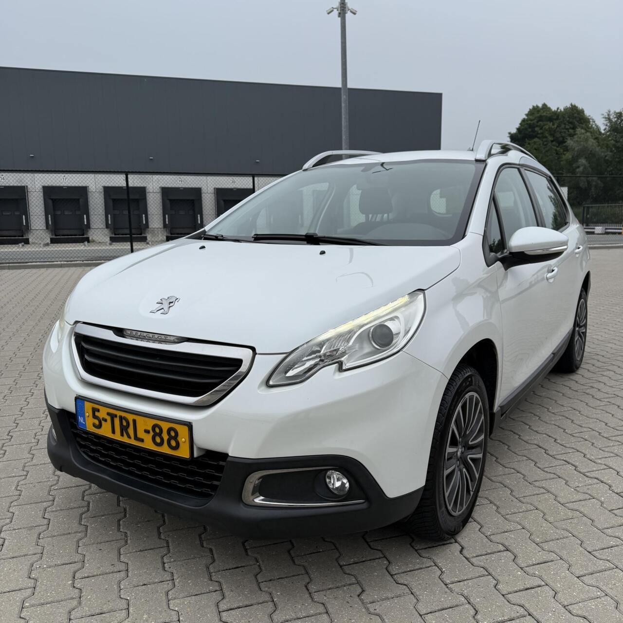Peugeot 2008 - 1.2 Allure | Automaat | Navi | NW APK ! - AutoWereld.nl