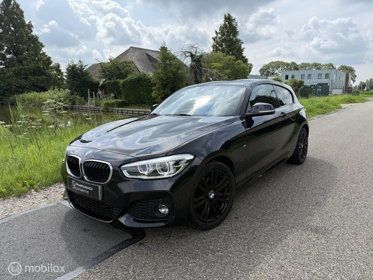 BMW 1-serie - 118i M Sport Edition / Navi / Camera / Cruise - AutoWereld.nl