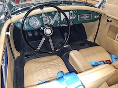 MG A 1500 - 1800 cc MGB motor/ 5x gelagerd. 123 Electr. ontst. Ford Sierra 5 versn. Achter Koni schokd