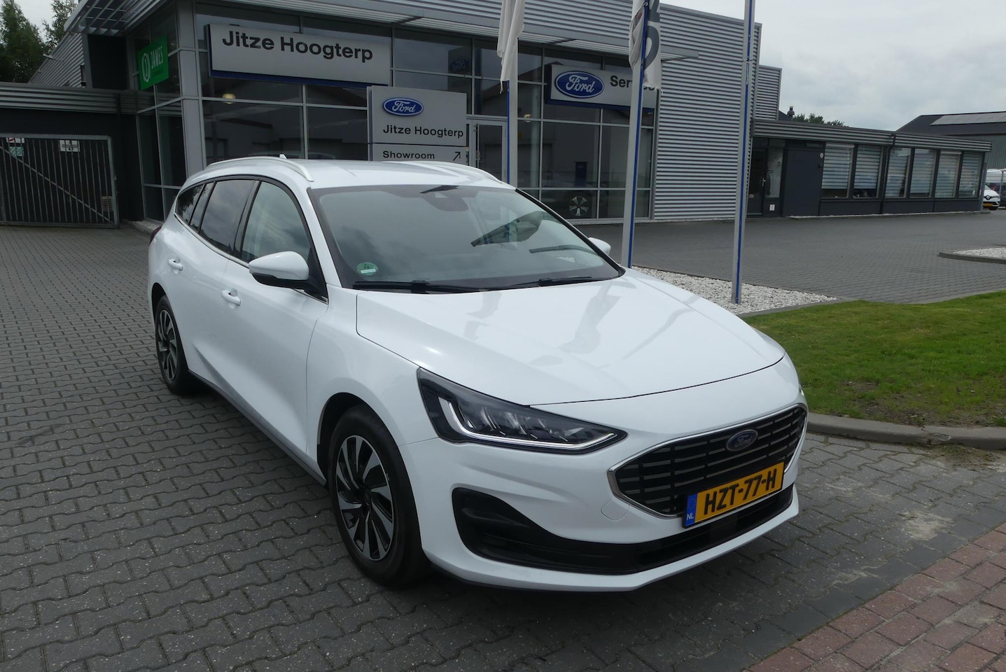 Ford Focus Wagon - 1.0 EcoBoost Hybrid Titanium CRUISE, CLIMA, NAVI, STOEL/STUURVERWARMING, PDC V&A, 36.013KM - AutoWereld.nl