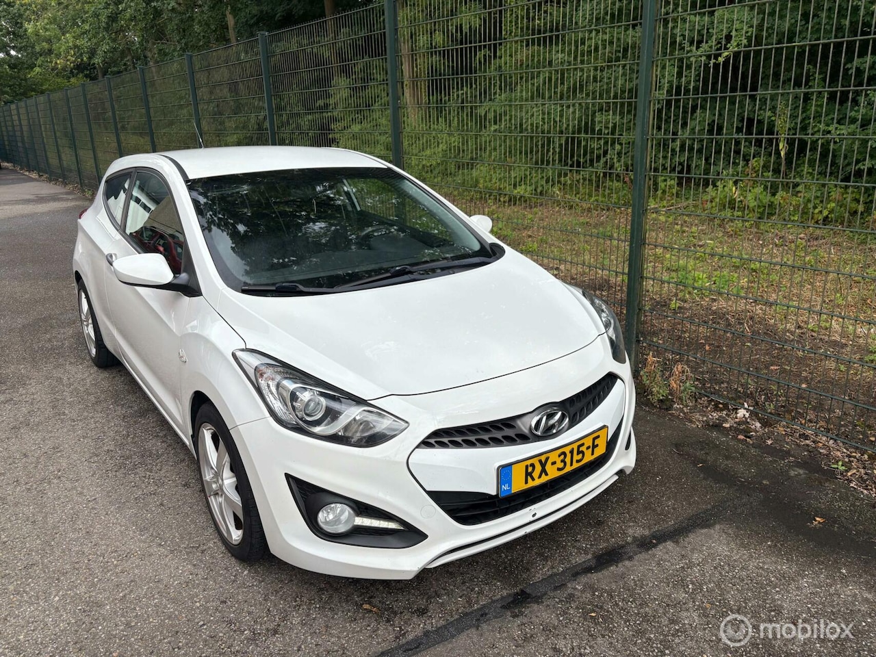 Hyundai i30 - 1.4 Coupe - AutoWereld.nl
