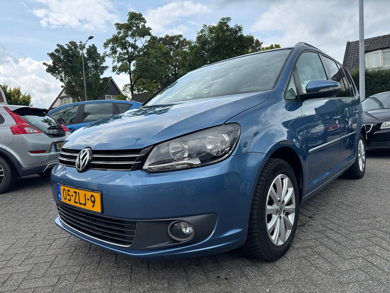 Volkswagen Touran - 1.2 TSI Highline BlueMotion 1.2 TSI Highline BlueMotion 105pk,Apk 29/1/26,Airco,Cruise,Navi,Elek-pakket, - AutoWereld.nl
