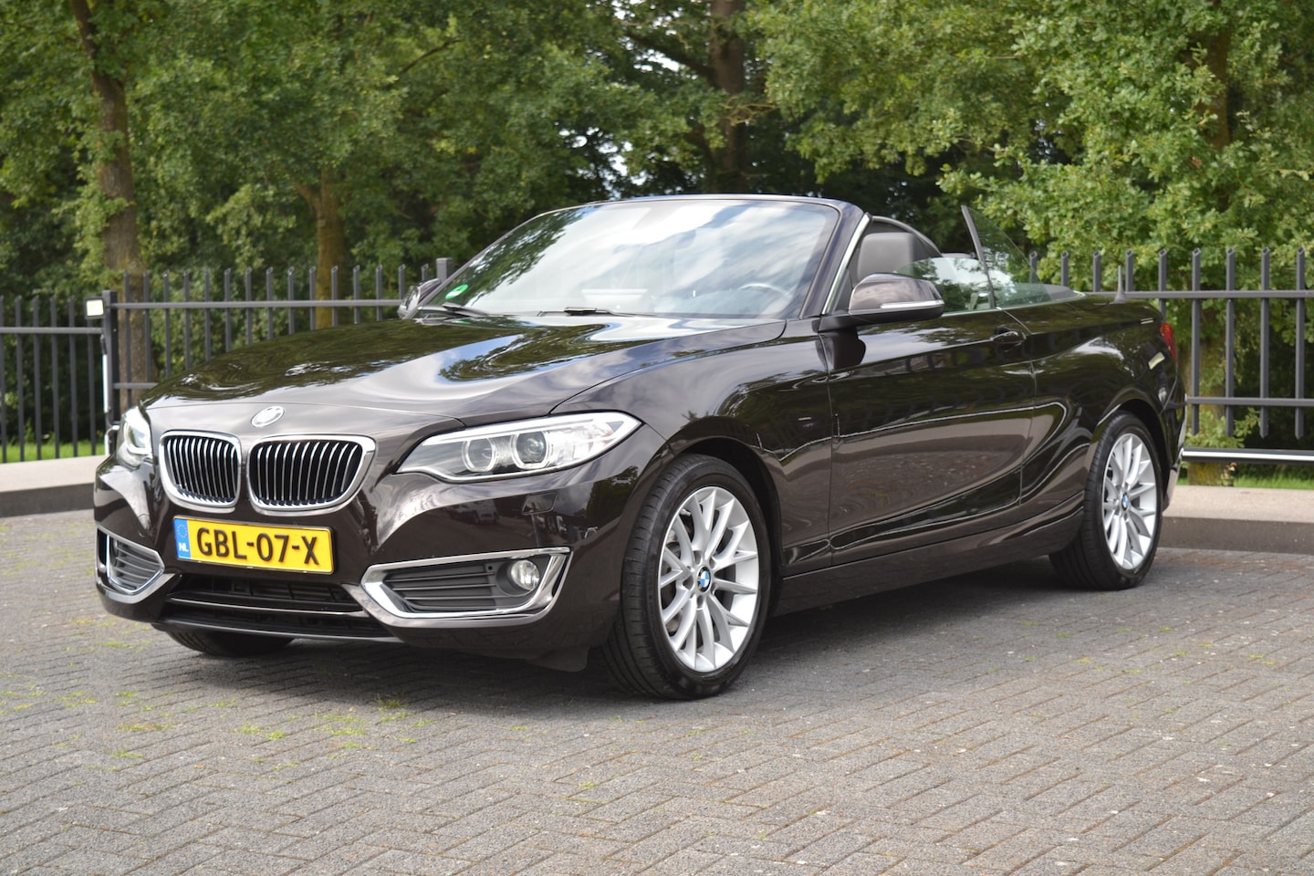 BMW 2-serie Cabrio - 218i Luxury Leder | Navi | PDC | Climate | Xenon LED | Cruise | Trekhaak - AutoWereld.nl