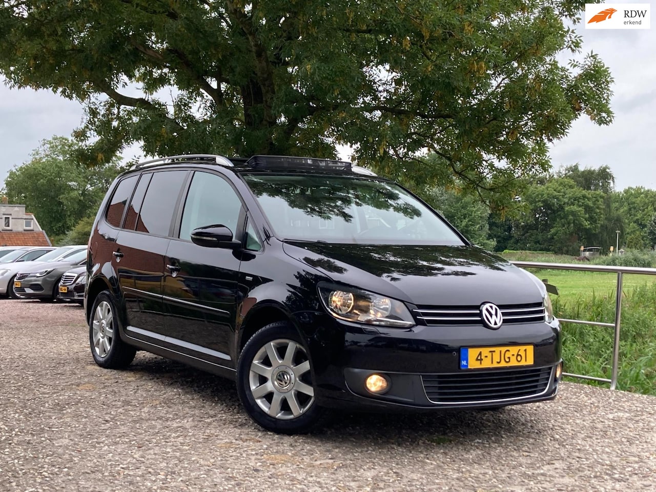Volkswagen Touran Cross - 1.6 TDI 7p. | Panodak + Navi + Clima + Cruise nu €7.975,-!! - AutoWereld.nl