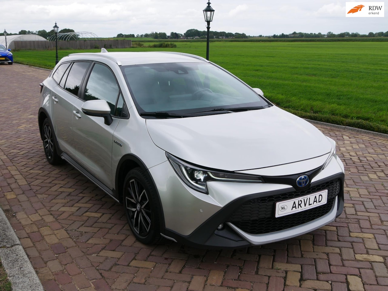 Toyota Corolla Touring Sports - 1.8 Hybrid Trek AUT 2021 ACC NAVI CAMERA - AutoWereld.nl