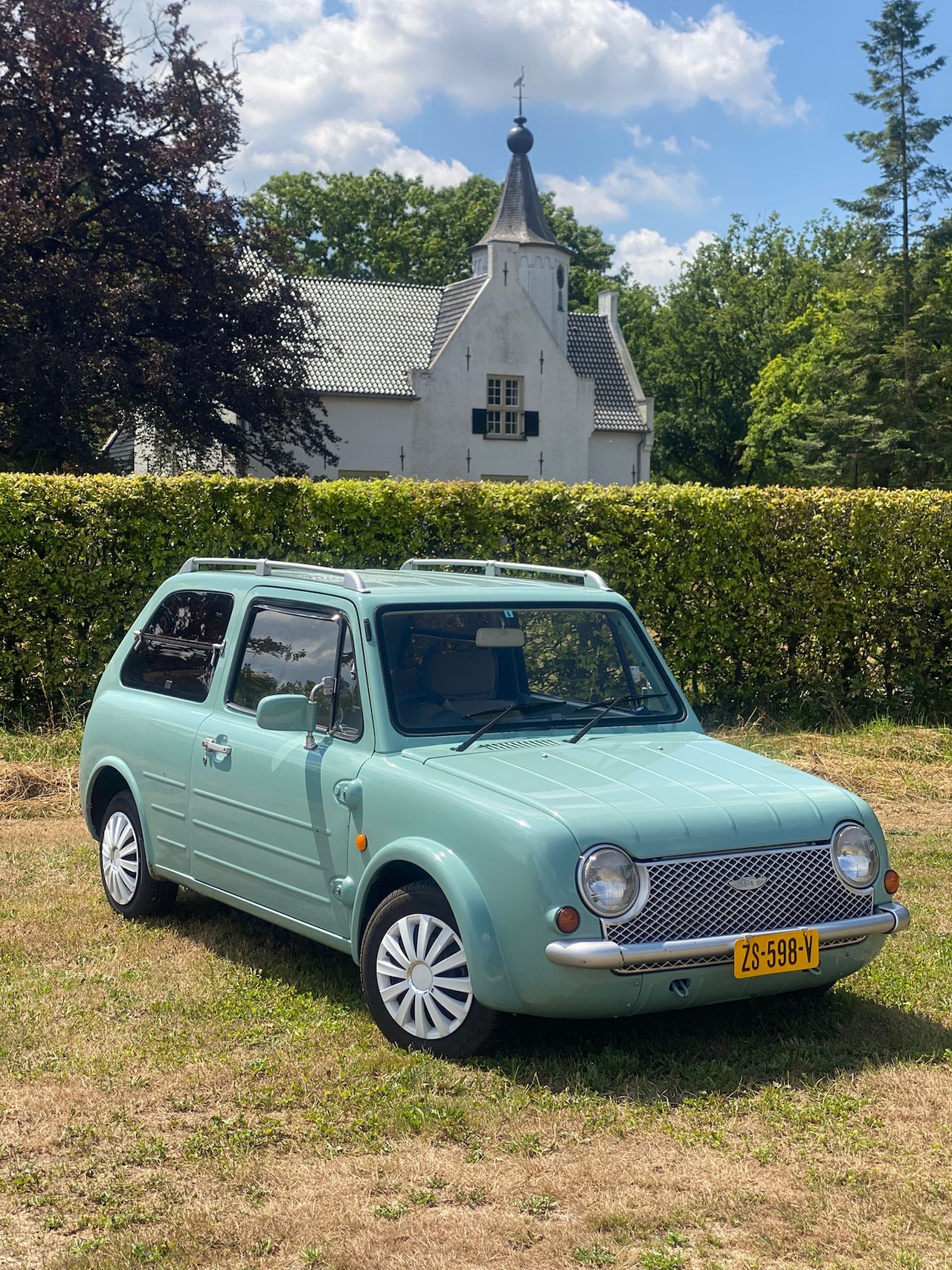 Nissan Figaro - Het is een Nissan PAO, het zusje van de Figaro, maar deze stond niet in de lijst erbij... - AutoWereld.nl