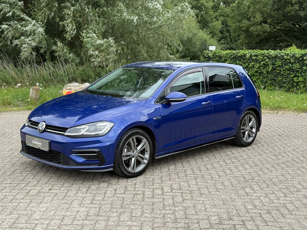 Volkswagen Golf - 1.5 TSI Highline R-LINE I PDC I NAVI I 150PK I STOELVER I CRUISE - AutoWereld.nl