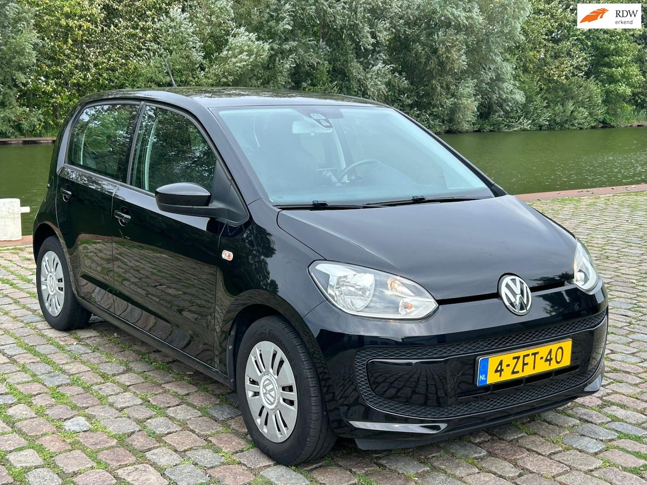 Volkswagen Up! - 1.0 move up! BlueMotion airco elektrische ramen cv op afs - AutoWereld.nl