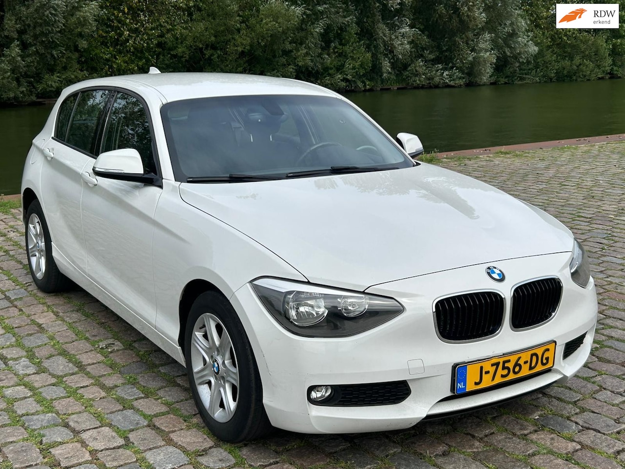 BMW 1-serie - 114i EDE airco cruis control cv op afs elektrische ramen - AutoWereld.nl