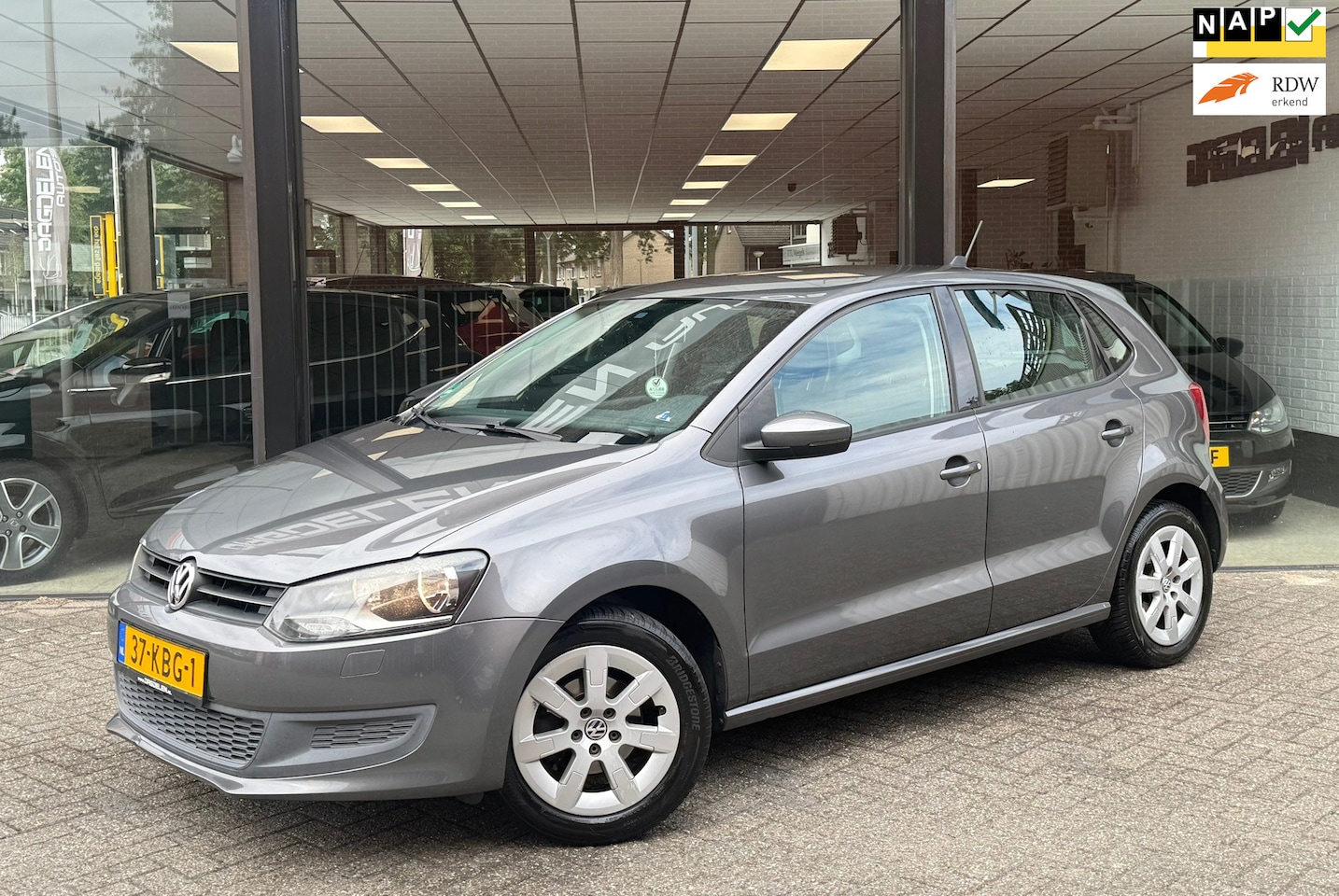 Volkswagen Polo - 1.4-16V Comfortline 2e EIG | AIRCO | NAVI | CRUISE | NAP - AutoWereld.nl