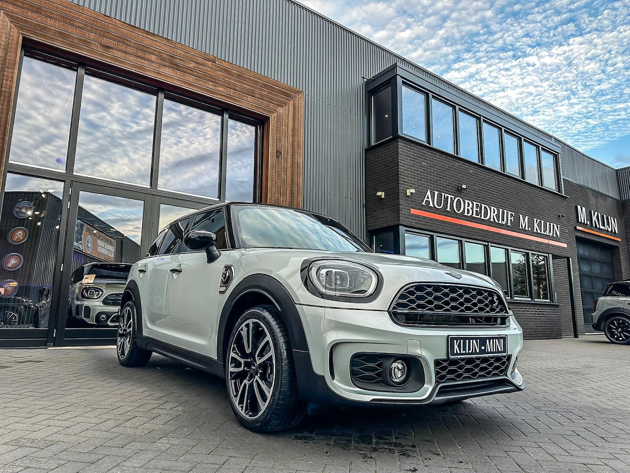 MINI Countryman - Mini 2.0 Cooper S E ALL4 John Cooper Works aut 220pk/Camera/19"Jcw/Navi/Led - AutoWereld.nl