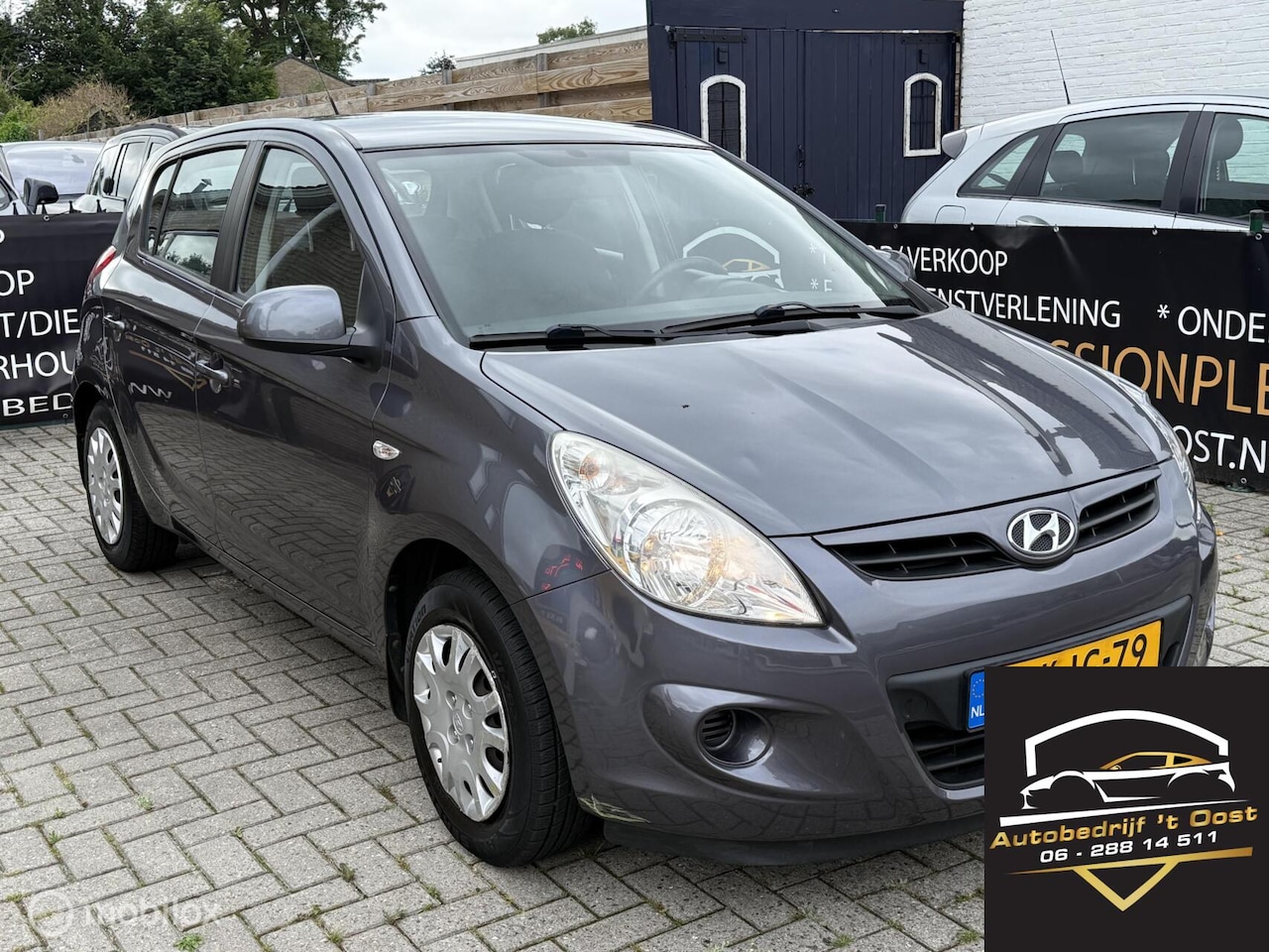 Hyundai i20 - 1.2i i-Drive boekjes erbij airco, trekhaak 5drs - AutoWereld.nl