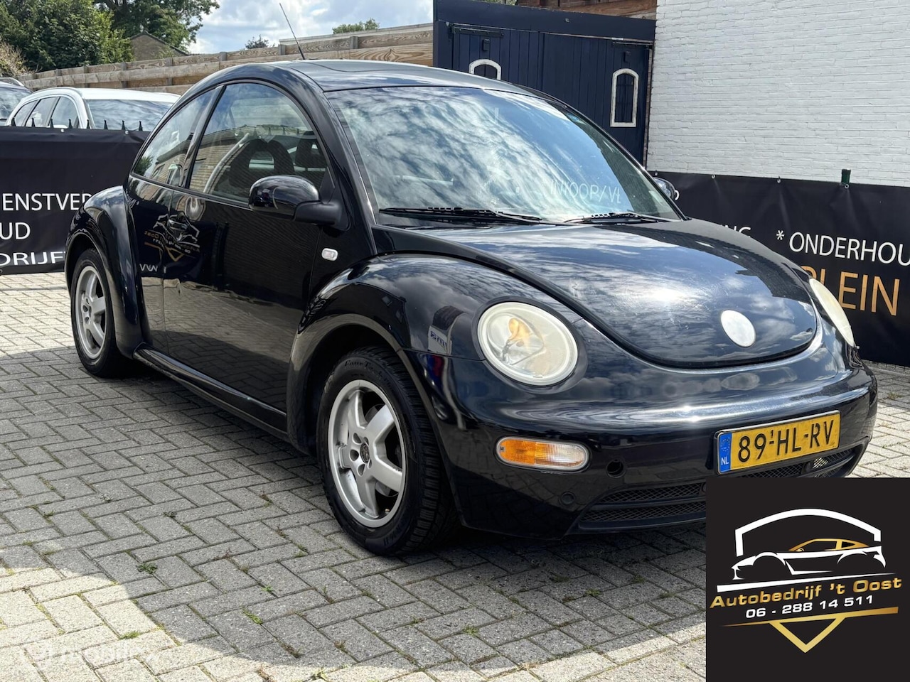 Volkswagen New Beetle - 2.0 Highline nw apk | airco | cruise - AutoWereld.nl