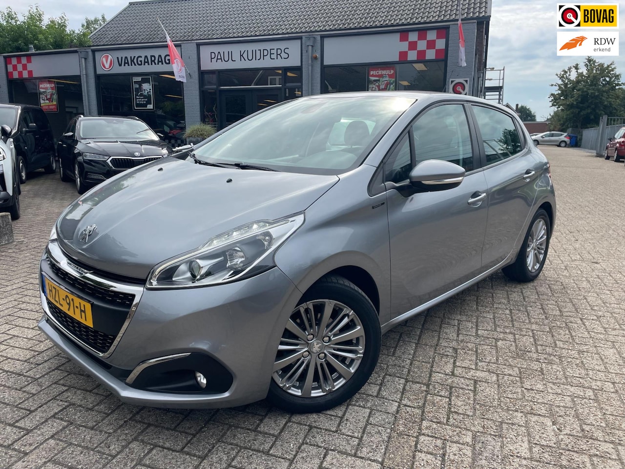 Peugeot 208 - 1.2 PureTech 83pk Signature 5-deurs *navi + pdc + Apple/AndroidCarplay + LM-velg* - AutoWereld.nl