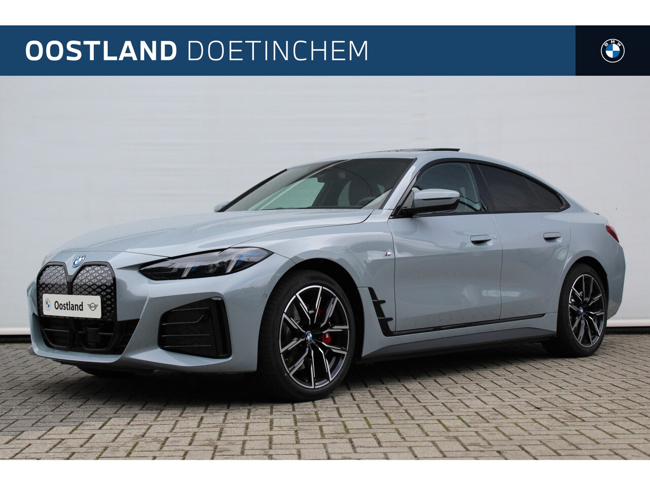 BMW i4 - eDrive35 High Executive M Sport / Schuif-kanteldak / Trekhaak / Adaptieve LED / Active Cru - AutoWereld.nl