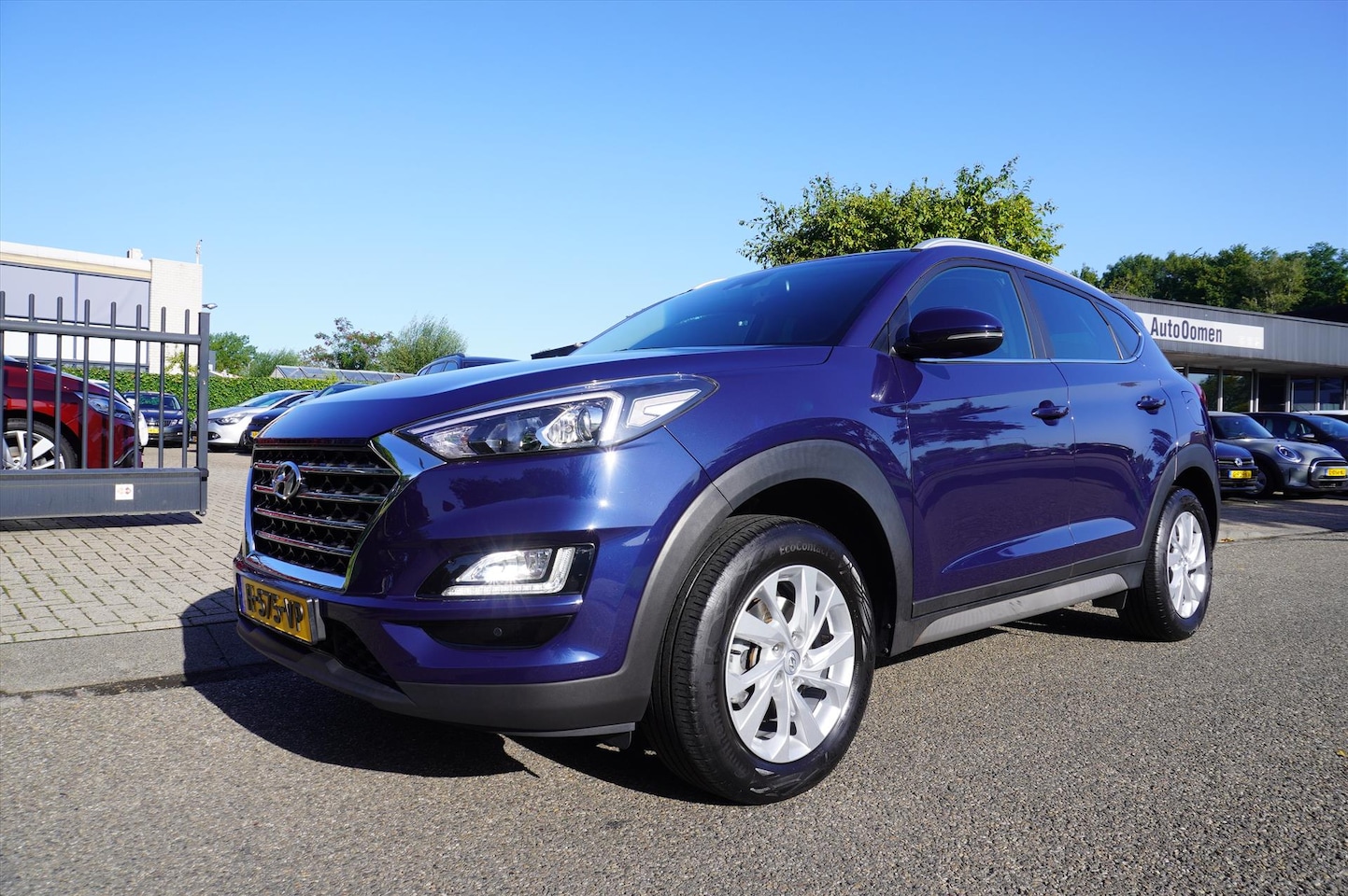 Hyundai Tucson - 1.6 GDi 132pk Comfort Navigatie Parkeer Camera - AutoWereld.nl
