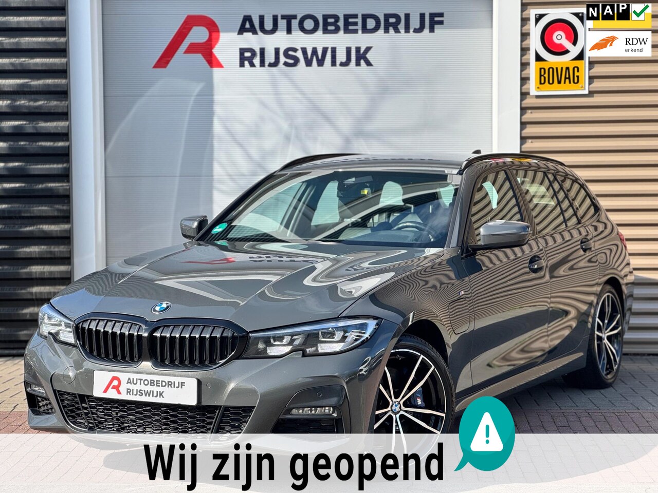 BMW 3-serie Touring - 330e M Sport Dravit Grau! BTW! - AutoWereld.nl