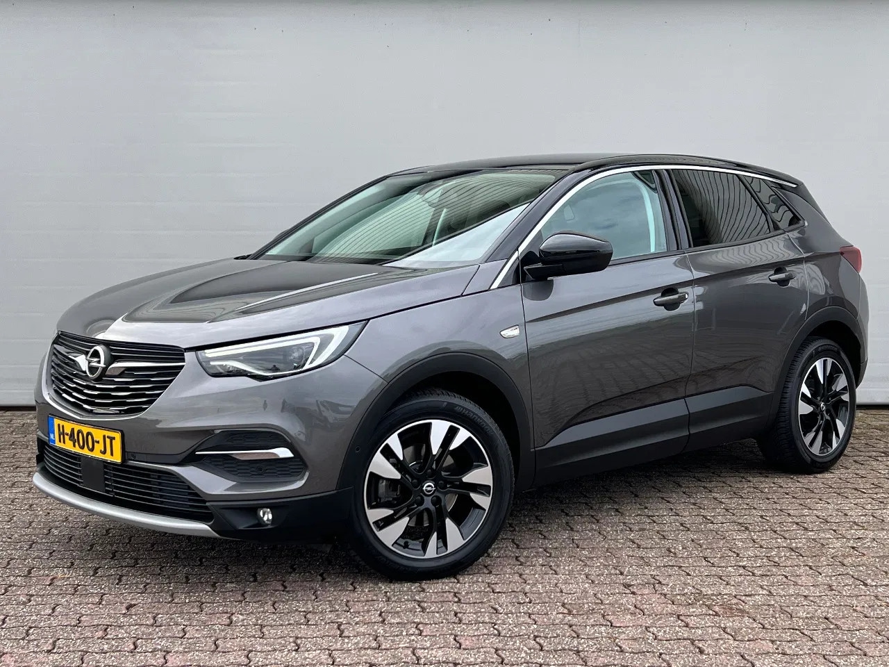 Opel Grandland X - 1.2 Turbo Business Executive | Two-tone lak | Automaat | Trekhaak | NL auto - AutoWereld.nl