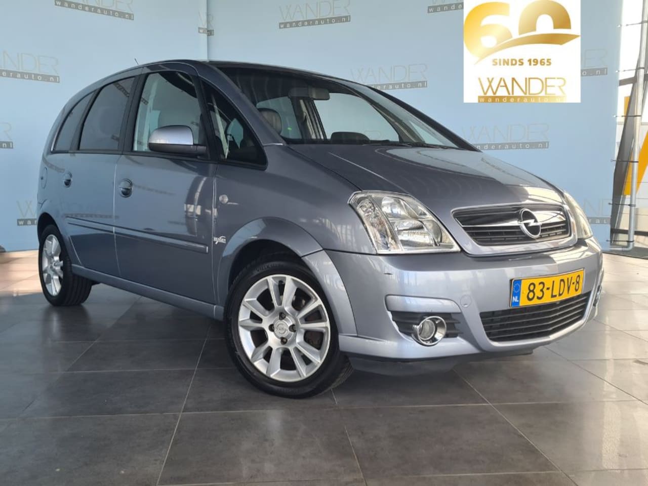 Opel Meriva - 1.6 Cosmo /Afneembare trekhaak/Airconditioning/Halflederen bekleding - AutoWereld.nl