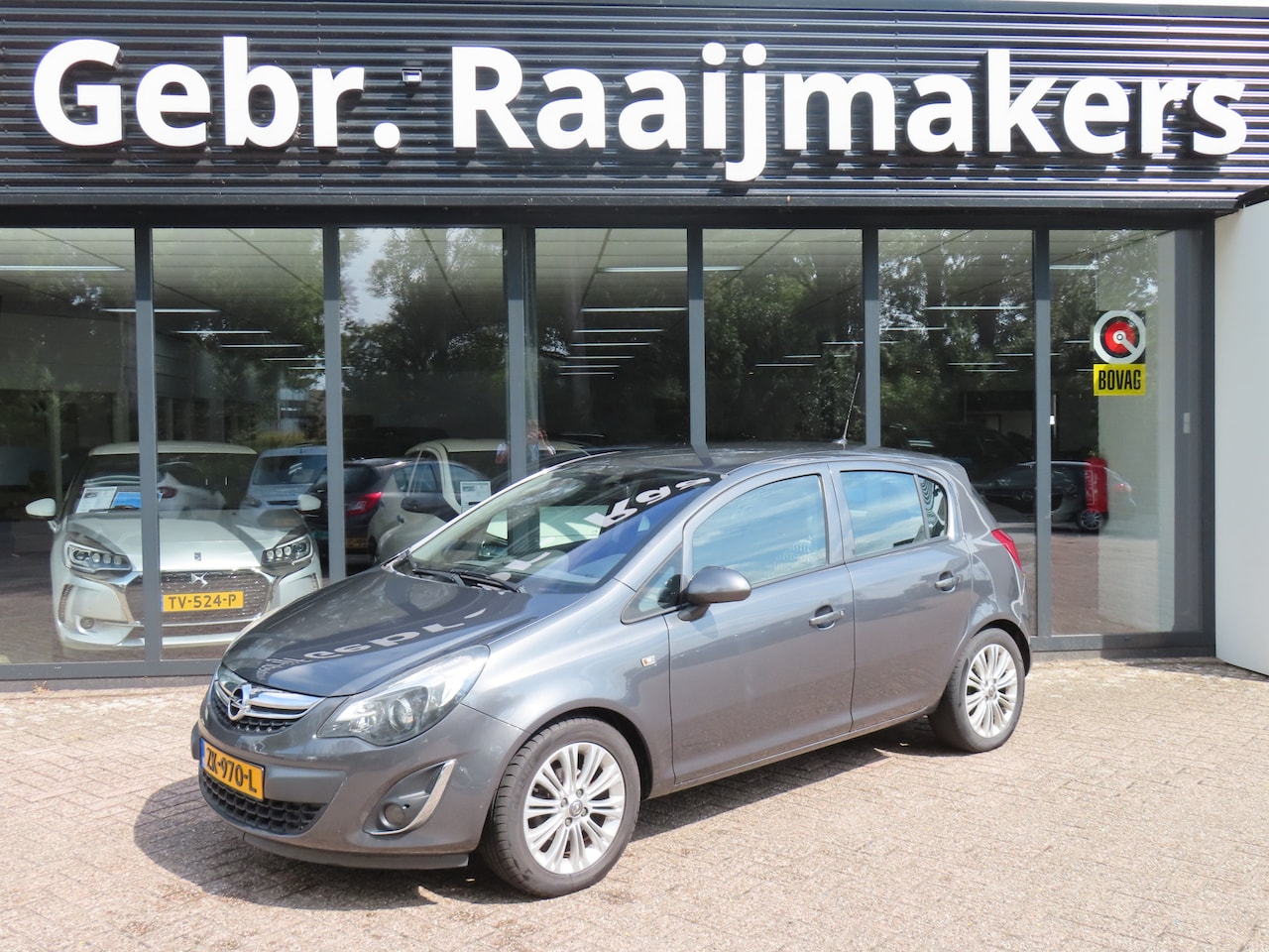 Opel Corsa - 1.4-16V Cosmo*Airco*Cruise*stoelverwarming* - AutoWereld.nl