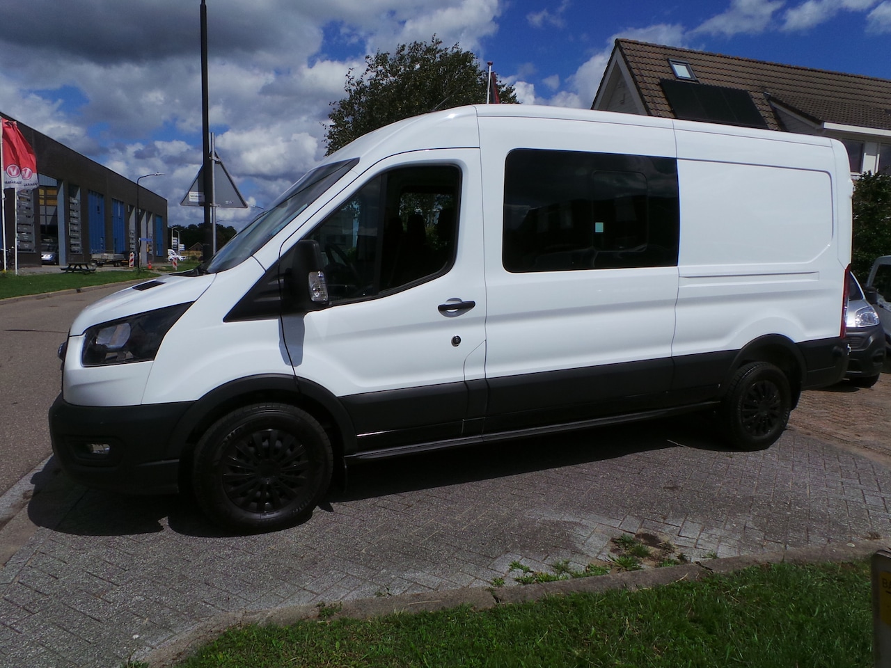 Ford Transit - 350 2.0 TDCI 130pk 7 persoons L3H2 DC Airco,Cruise,Pdc,Enz - AutoWereld.nl