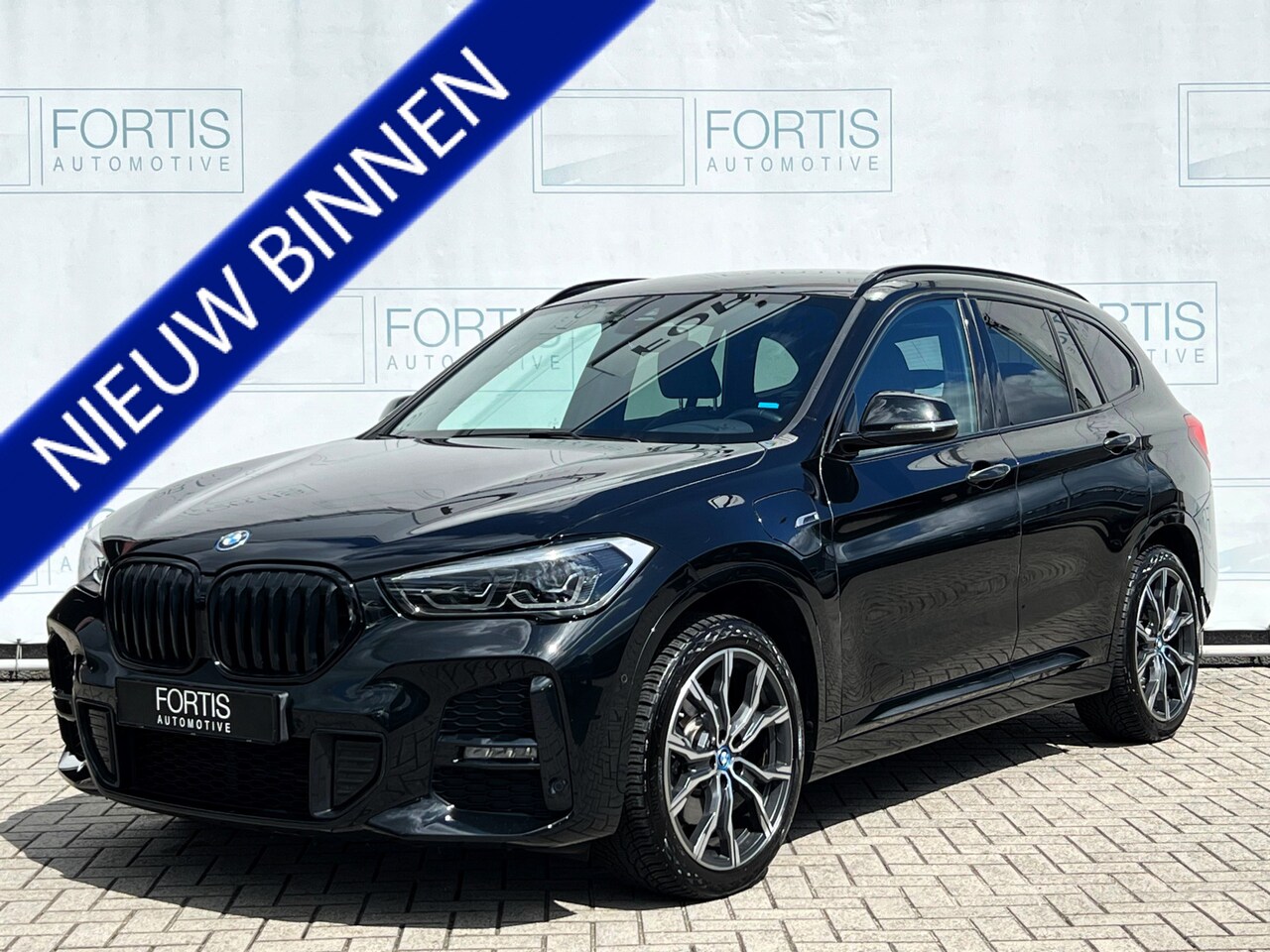 BMW X1 - xDrive25e Executive M Sport STOELVERW | PDC | NAVI | 19'INCH | SPORTSTOELEN | DEALER ONDER - AutoWereld.nl