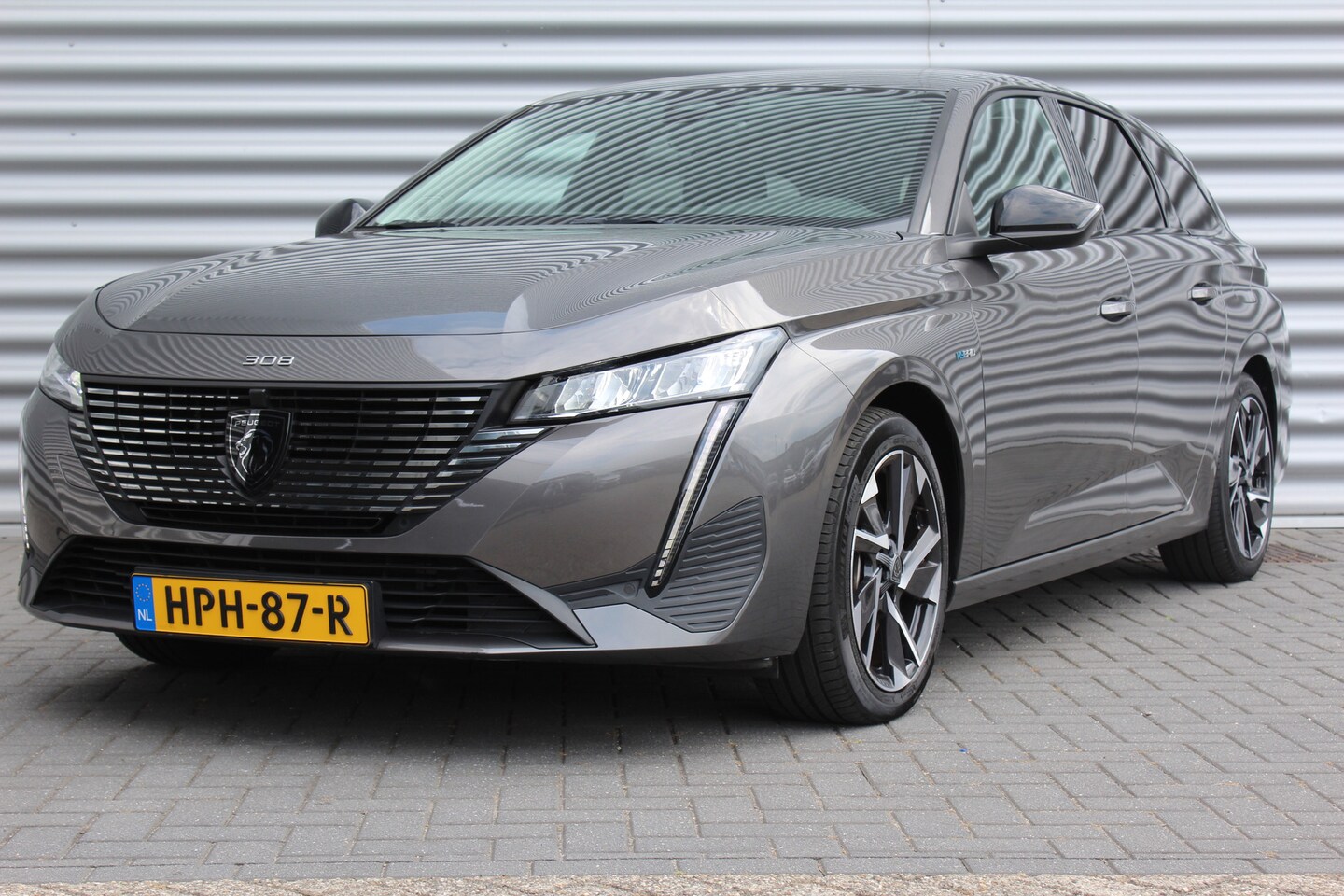 Peugeot 308 SW - 1.6 HYBRID 180PK ALLURE PACK AUTOMAAT / NAVI / LEDER / CLIMA / LED / PDC / 17" LMV / CAMER - AutoWereld.nl