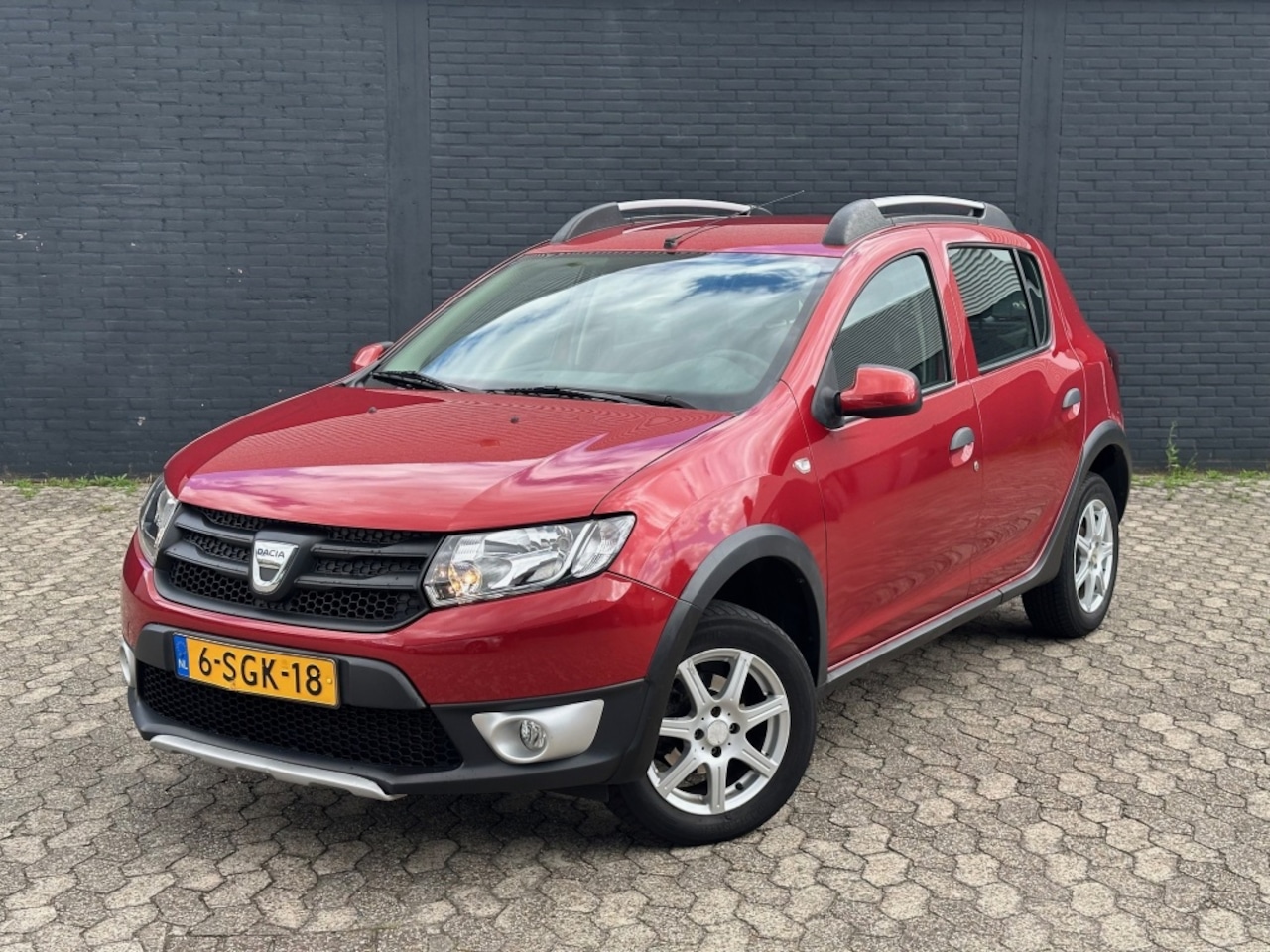 Dacia Sandero Stepway - 0.9 TCe Ambiance, Airco, Trekhaak, Perfect onderhouden - AutoWereld.nl